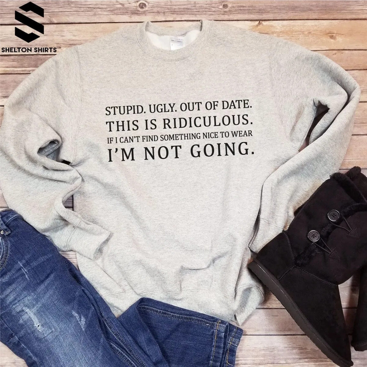 Stupid. Ugly. Out of date. If I can’t find something nice to wear. I’m not going Grinch Sweatshirt